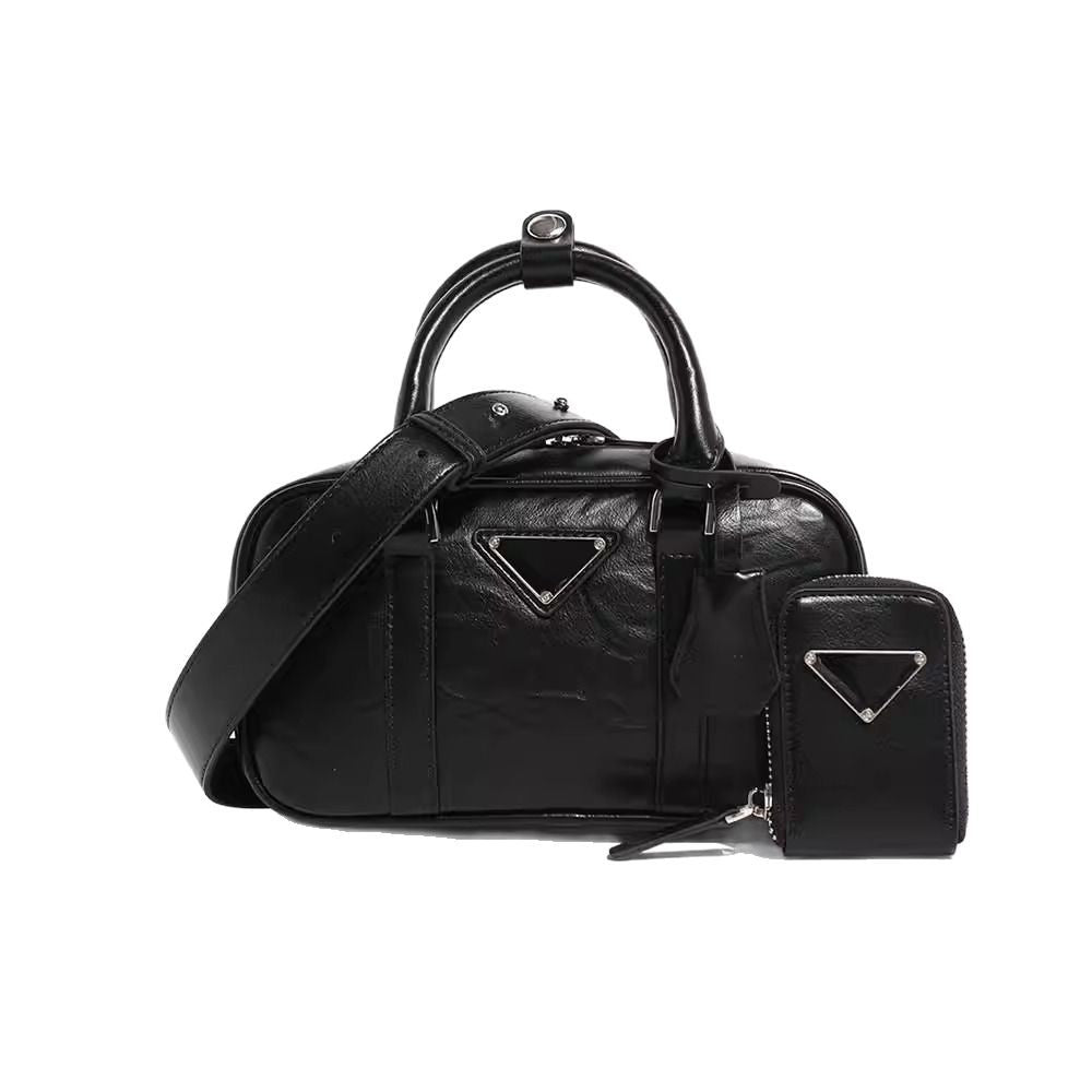 复古手提包包女2025春夏新款百搭保龄球枕头包单肩斜挎包真皮女包