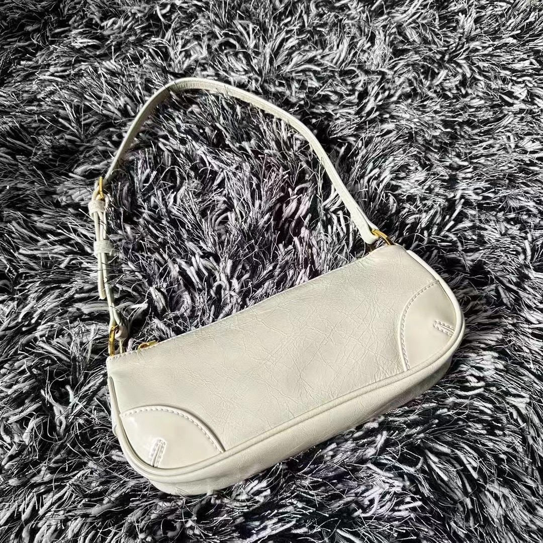 早春牛皮女包2024新款时尚潮流个性百搭单肩斜挎小包包潮真皮女包