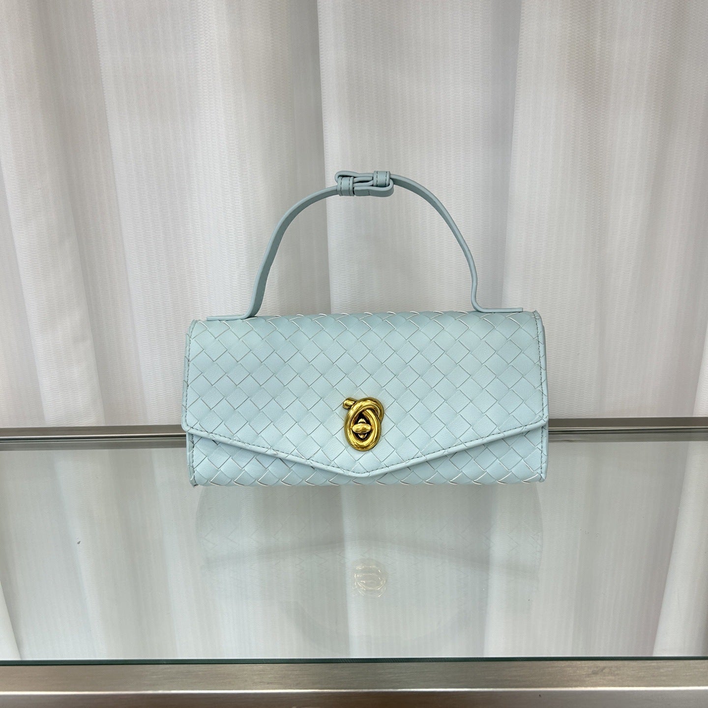 2025春夏新款knotlock牛皮信封包跨境时尚编织包单肩腋下手提包女