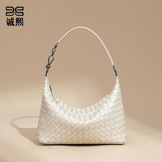 2025新款时尚小众腋下编织女包休闲纯色手提包潮流单肩斜挎饭盒包