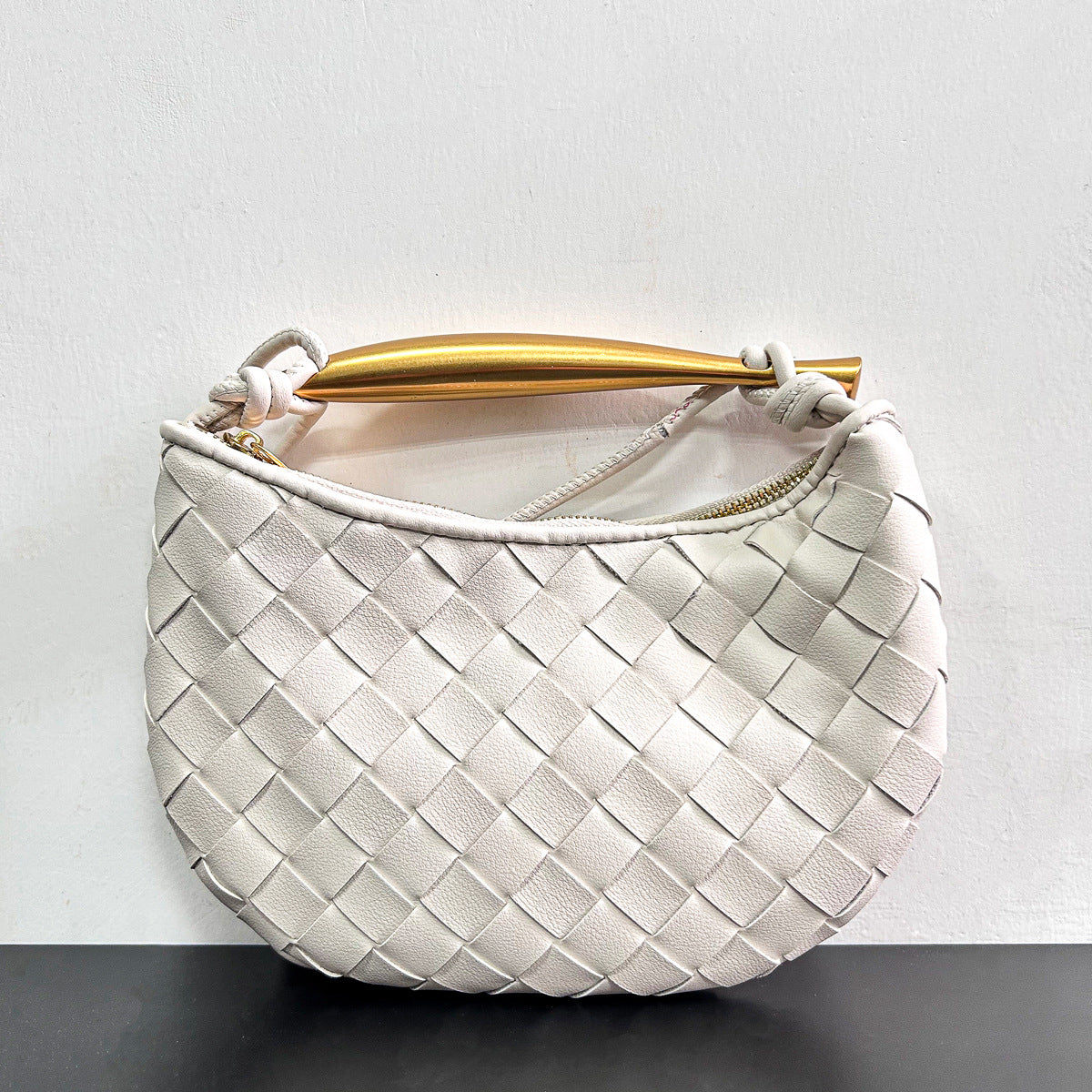 拉链款编织包包2023新款牛皮金属手柄月牙包单肩斜挎手提包时尚