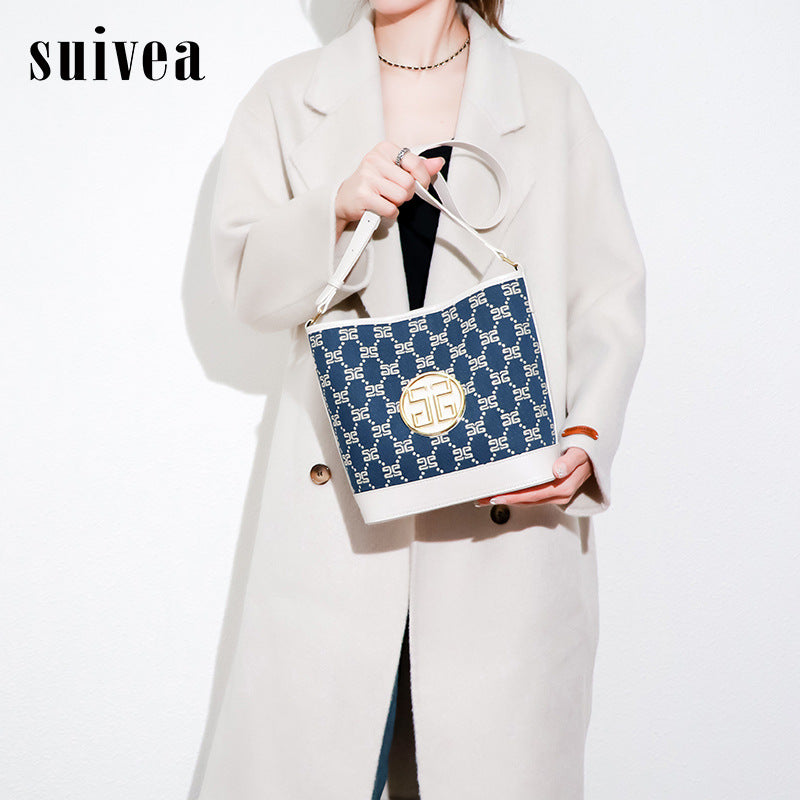 跨境夏季女高级感单肩斜挎水桶包小众印花棉麻pu大容量简约子母包