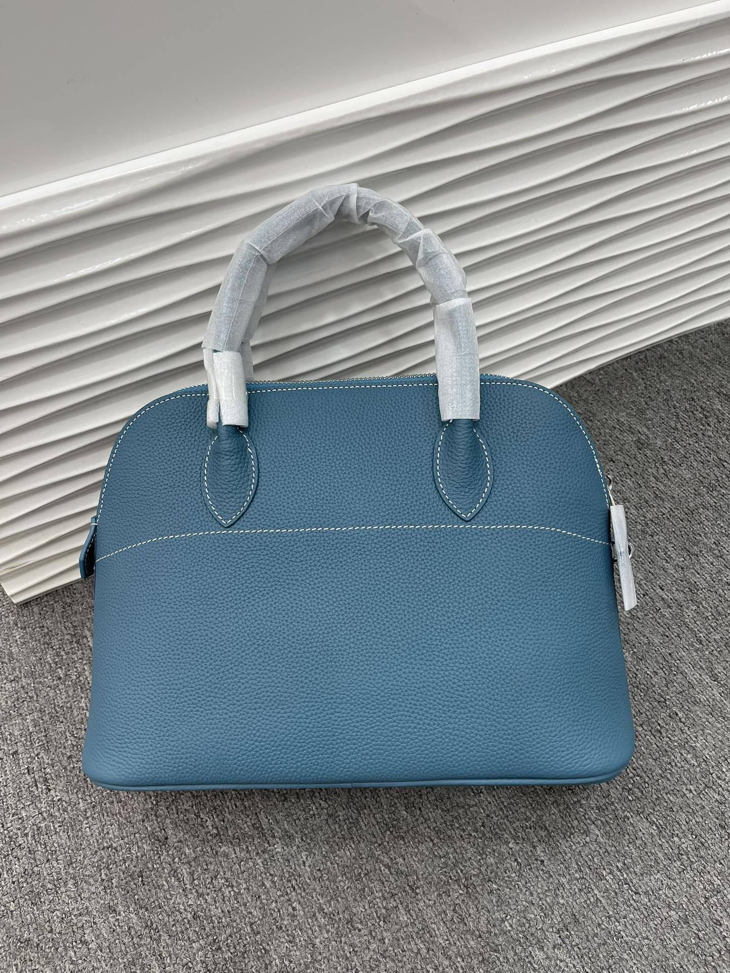 新款荔枝纹真皮贝壳包头层牛皮保龄球手提包拉链大容量通勤女包