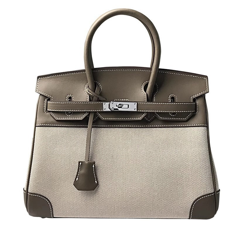 高品质时尚简约铂金包帆布拼接swift牛皮女包休闲桶包手提单肩包