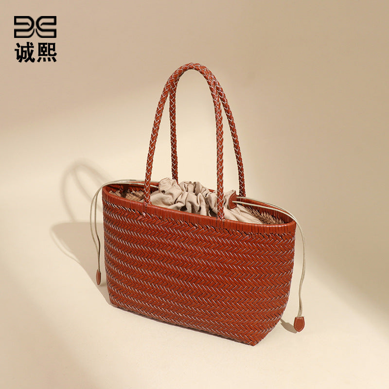 牛皮复古菜篮子手提托特女包个性手工编织包休闲度假风单肩腋下包