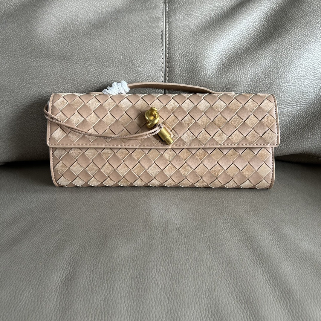 2024高级感真皮通勤法棍包秋冬百搭斜挎包女大容量菱格编织腋下包