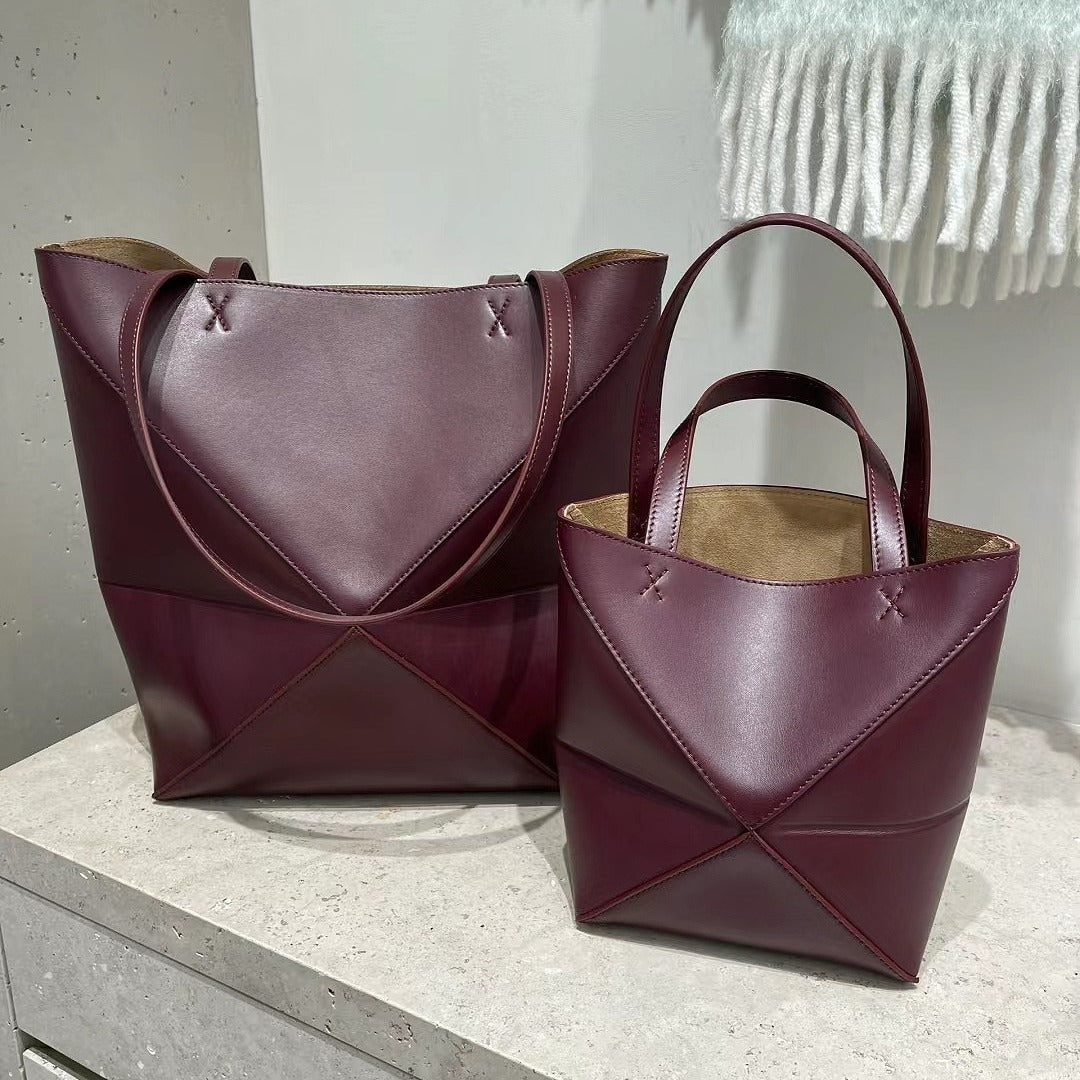 2024新款真皮女包变形几何拼接折叠托特单肩斜跨潮流双肩厂家