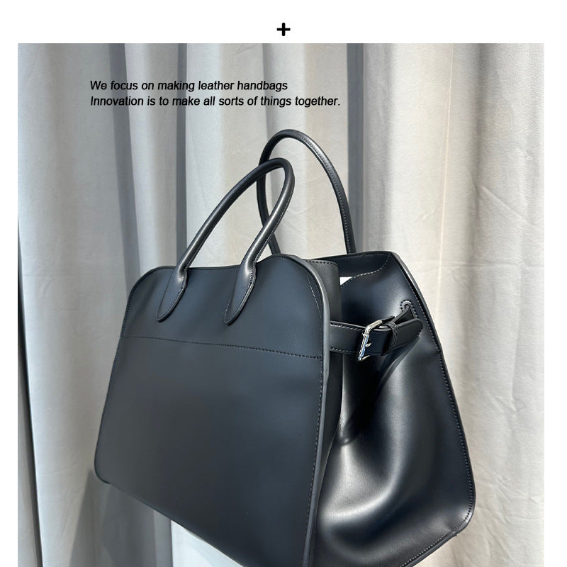 托特包包女士2024新款潮高级感黑色大容量手提公文包春夏通勤大包