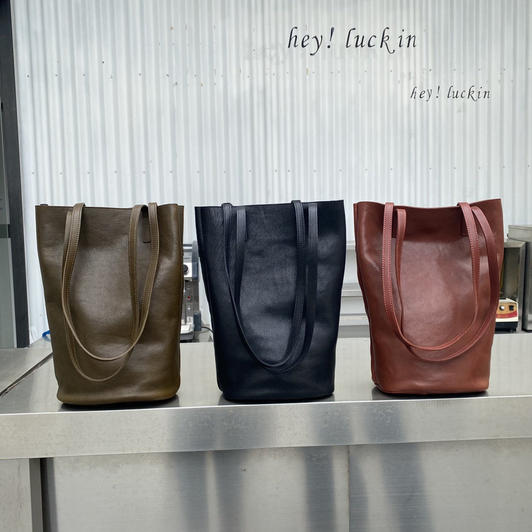 植鞣牛皮ins风慵懒复古通勤水桶托特包真皮百搭大容量单肩包 代发