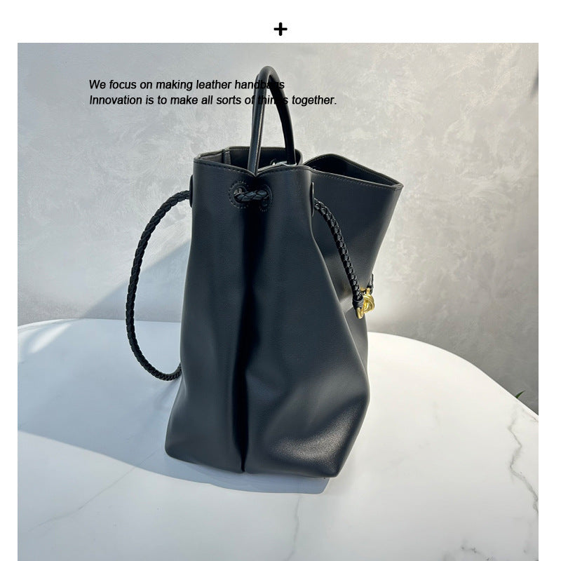 包包女2025新款质感真皮大容量托特包女斜跨通勤蝴蝶结单肩手提包