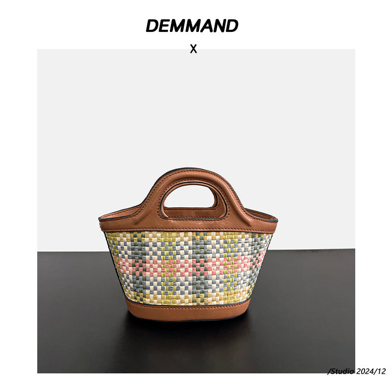 春夏小众沙滩草编拼牛皮波点菜篮子包休闲百搭单肩斜跨手提水桶包