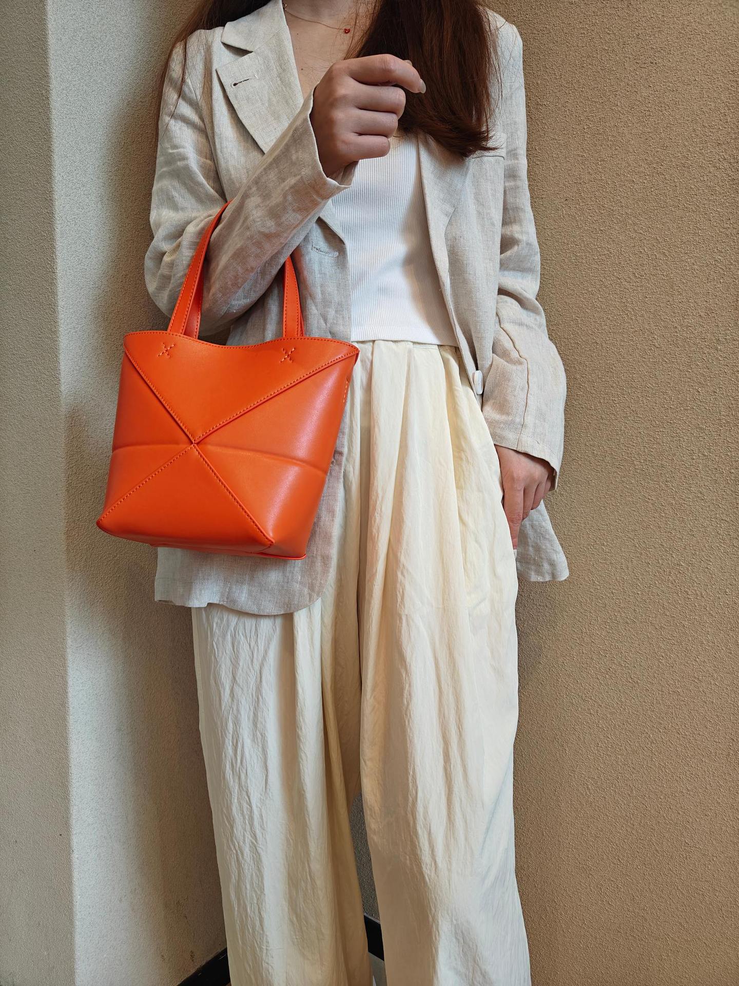 2024新款真皮女包变形几何拼接折叠托特单肩斜跨潮流双肩厂家