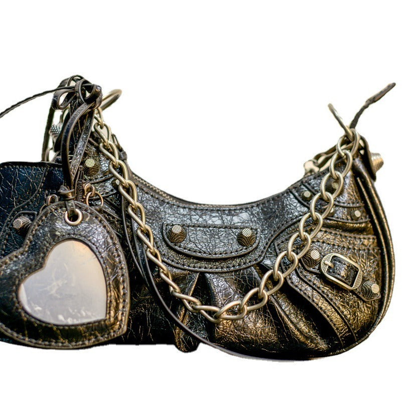 真皮包包女2022新款单肩轻奢月牙包质感法式腋下包铆钉流苏月牙褶