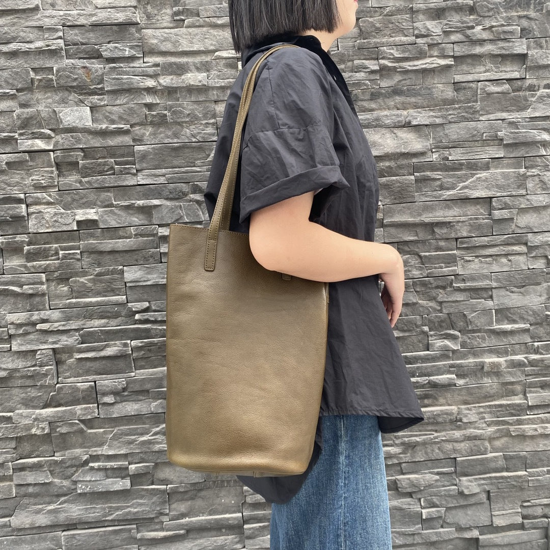 植鞣牛皮ins风慵懒复古通勤水桶托特包真皮百搭大容量单肩包 代发