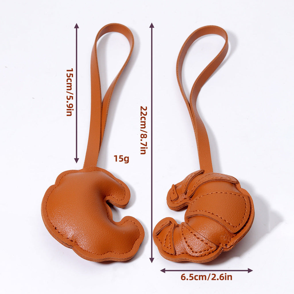 现货包挂miu系牛角包皮革小挂件包挂钥匙扣吊饰配件批发混批