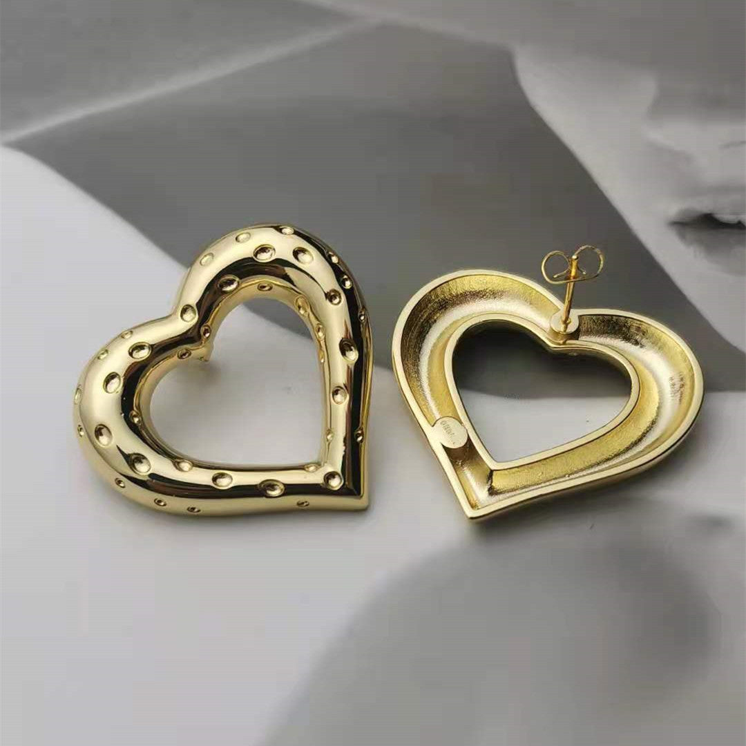 赛家新款大爱心耳钉女高级感气质港风批发银针镂空金色心形耳环