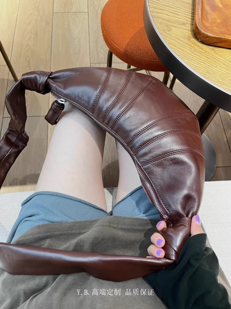 L家牛角包小众羊皮可颂包休闲饺子包真皮小号斜挎流浪胸包 批发