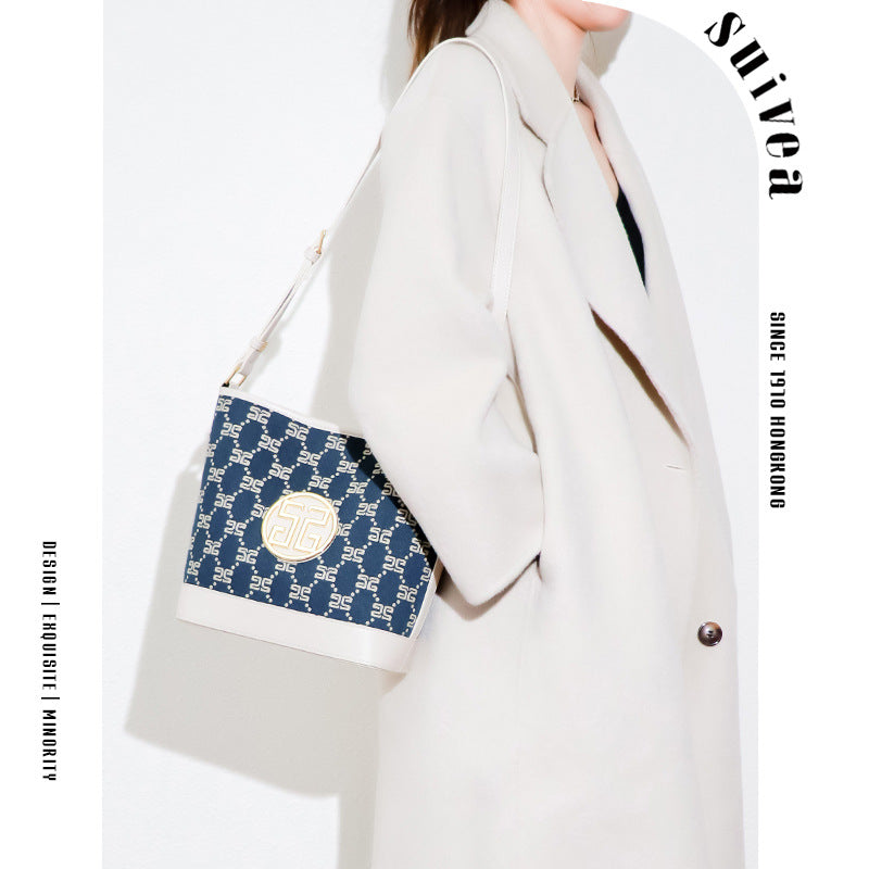 跨境夏季女高级感单肩斜挎水桶包小众印花棉麻pu大容量简约子母包