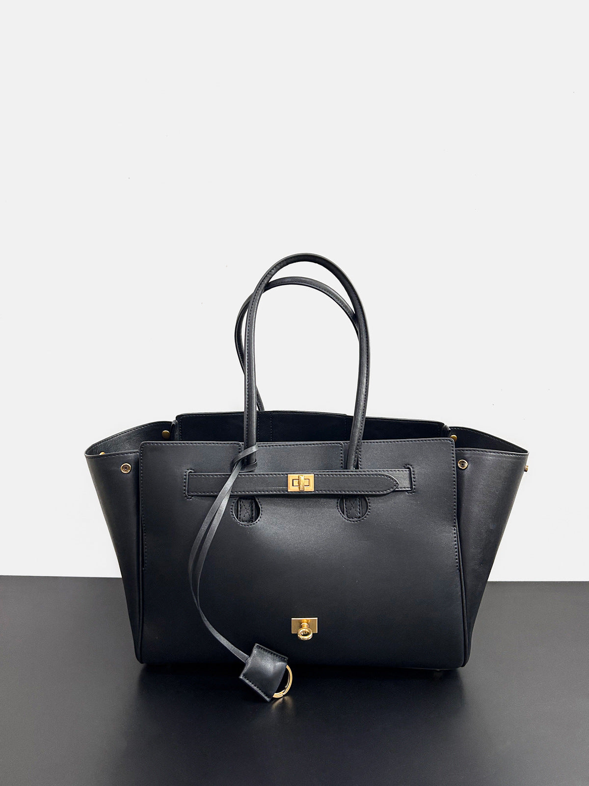 2024冬季新款锁扣托特包大容量中性机车包女头层牛皮真皮单肩包包