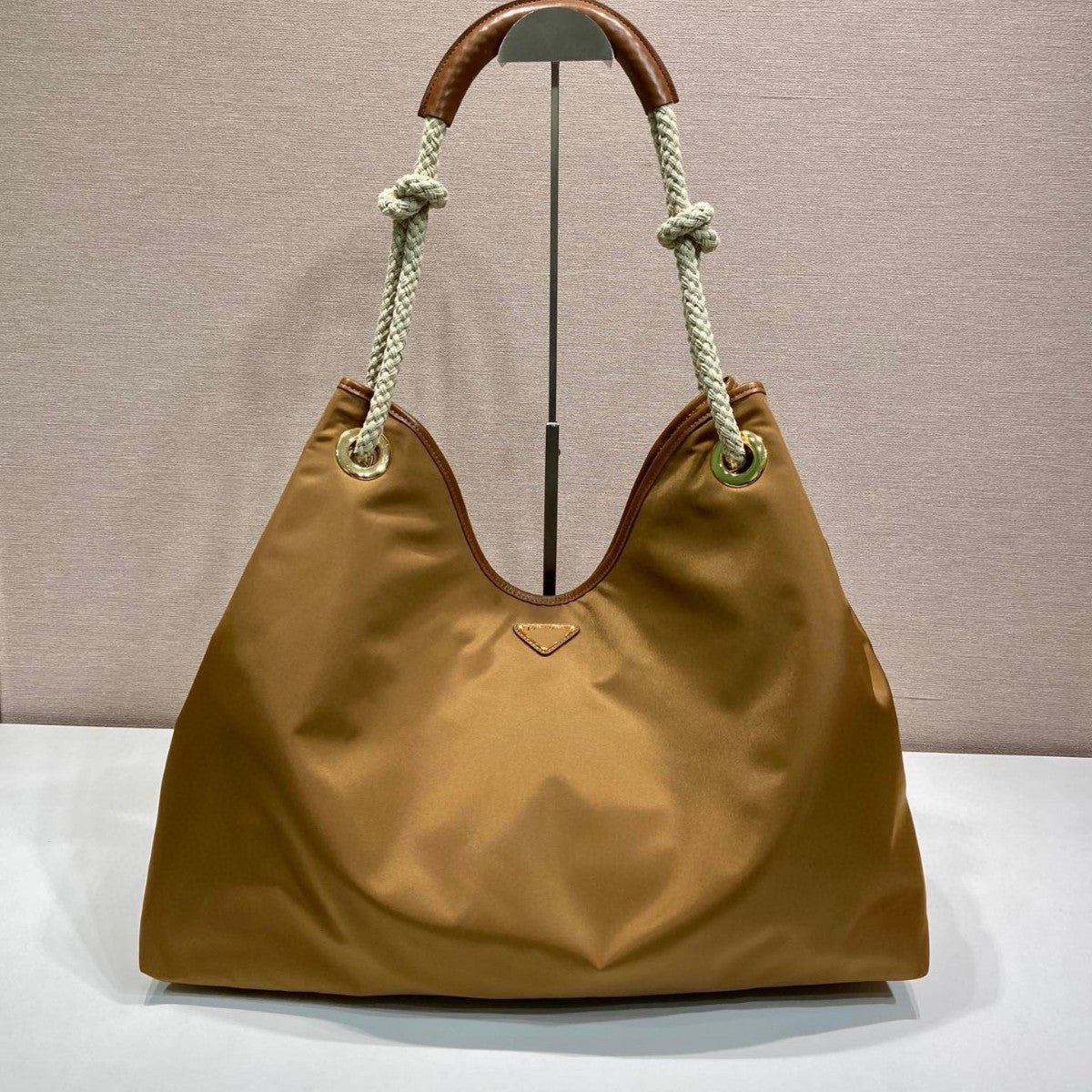 25新款进口防水尼龙抽绳水桶包P家简约时尚大容量手提单肩腋下包