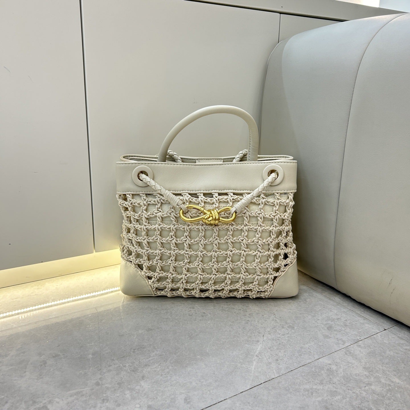 速卖通2025爆款拉菲草金属蝴蝶结托特包简约撞色手拎斜挎托特包包