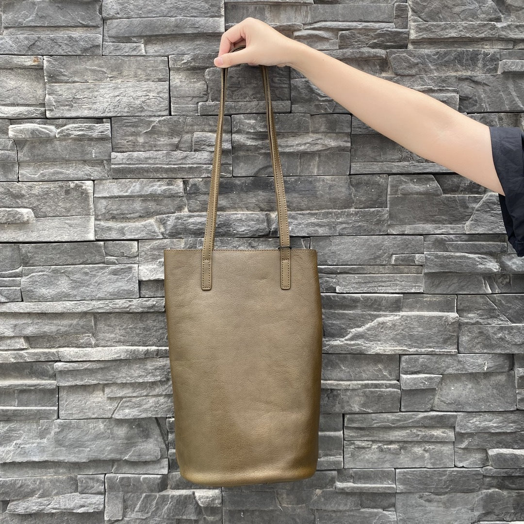 植鞣牛皮ins风慵懒复古通勤水桶托特包真皮百搭大容量单肩包 代发