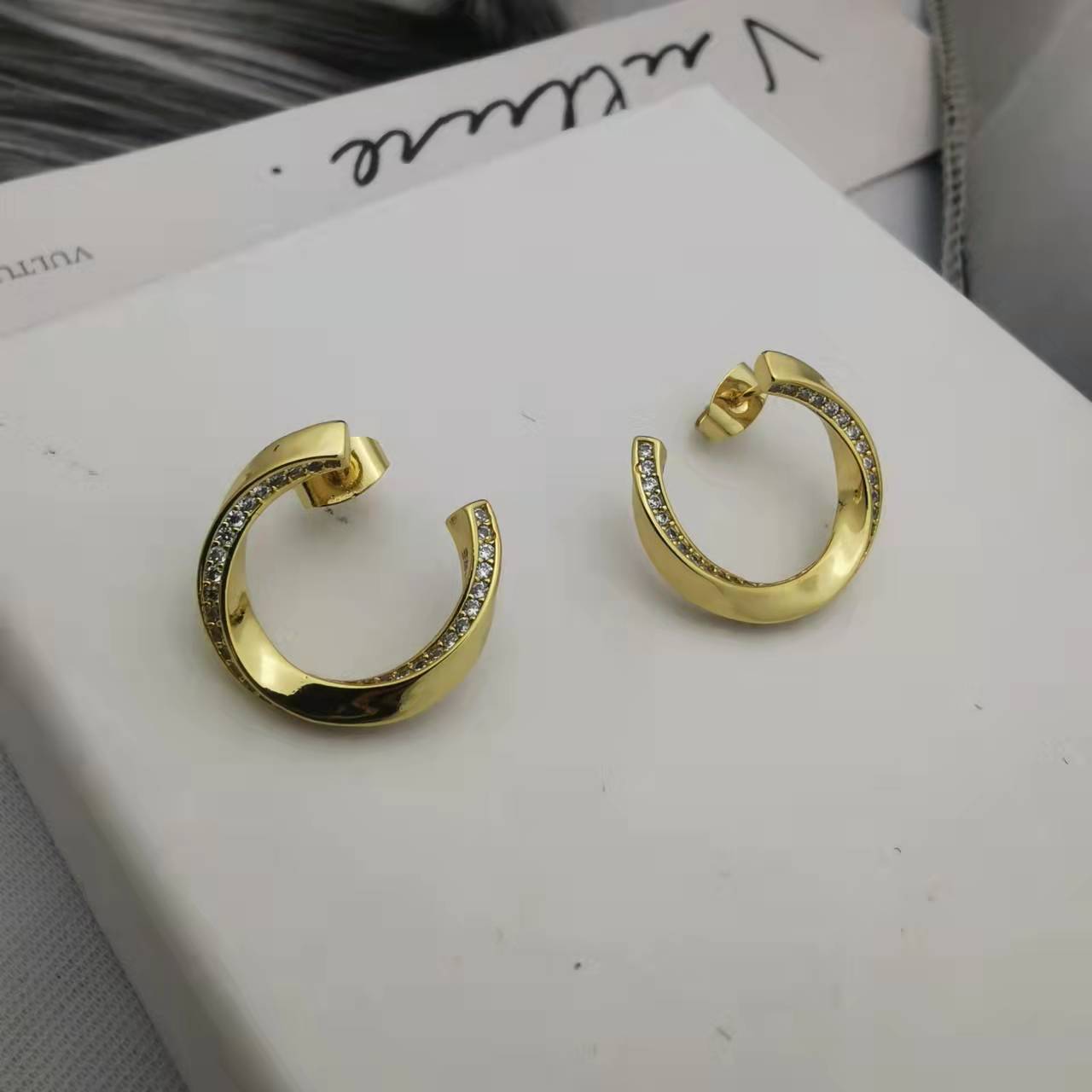 赛家21新款扭曲耳钉女镶钻高级感气质几何形celi镀金环形曲面耳环