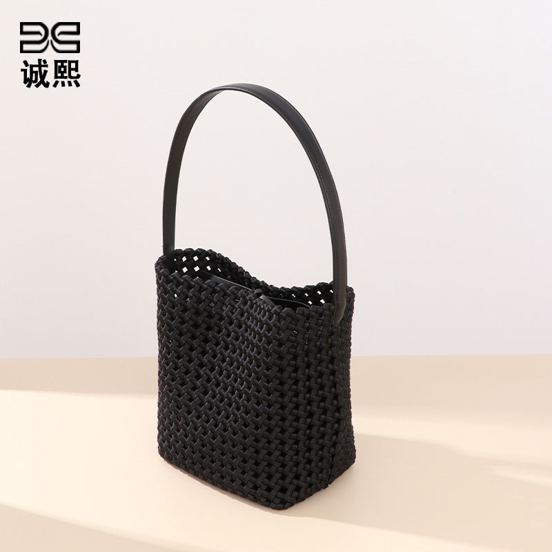 跨境潮流单肩包风车结镂空手拎水桶包高级感大容量女包子母腋下包