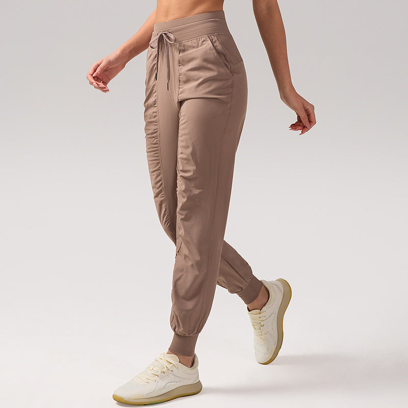 休闲宽松运动裤女压褶跑步瑜伽健身裤九分口袋速干透气束脚卫裤