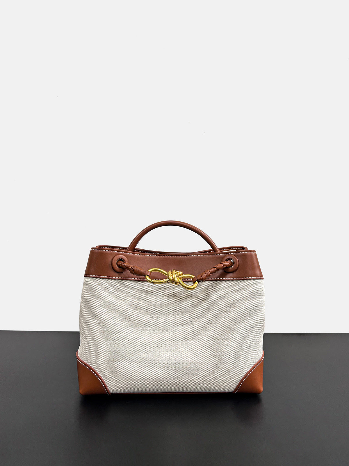 物著小众设计春季新款金属绳扣编织托特包单肩手提大容量复古女包