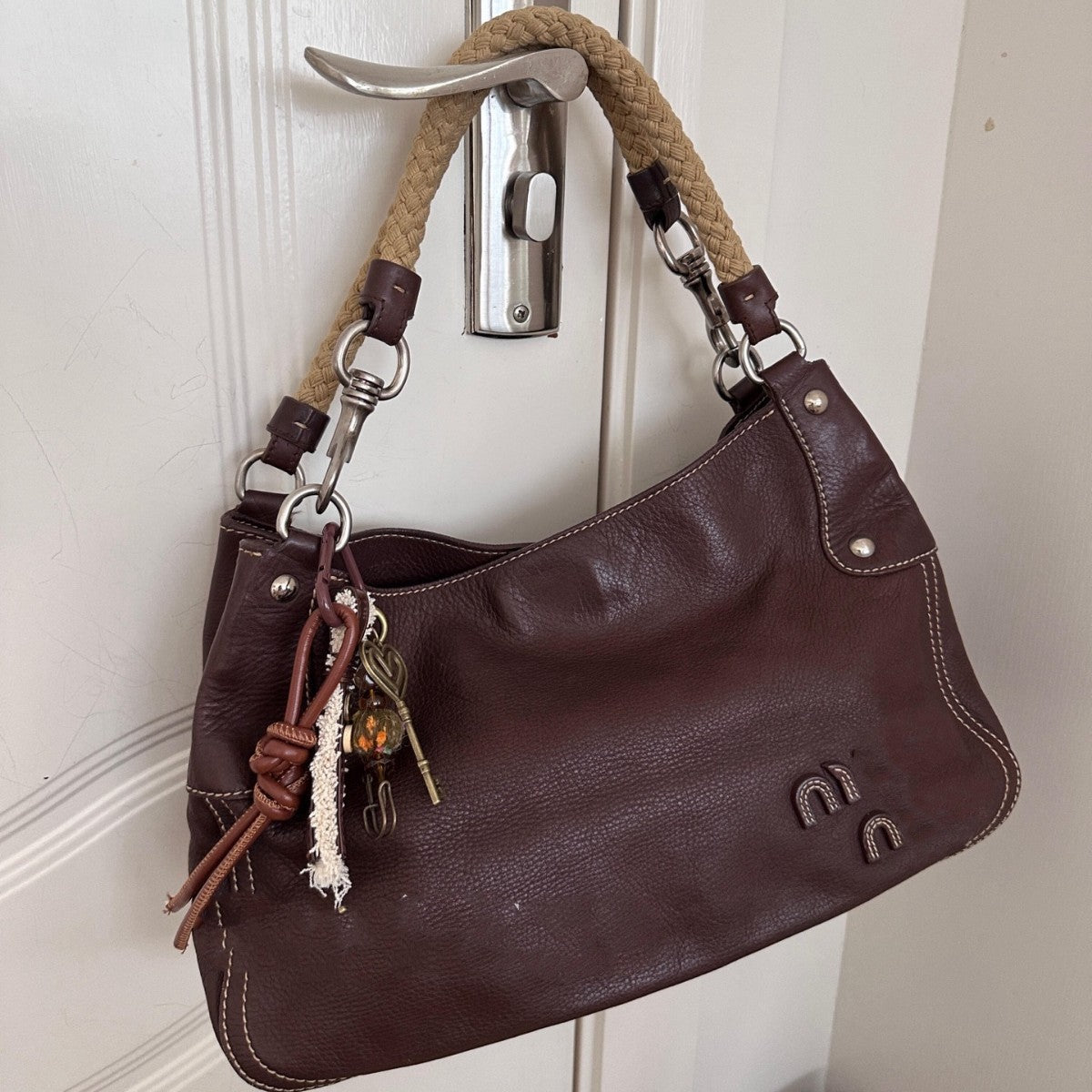 miu廖轻奢小众高级感腋下包2025新款夏季麻花手提单肩斜挎包女