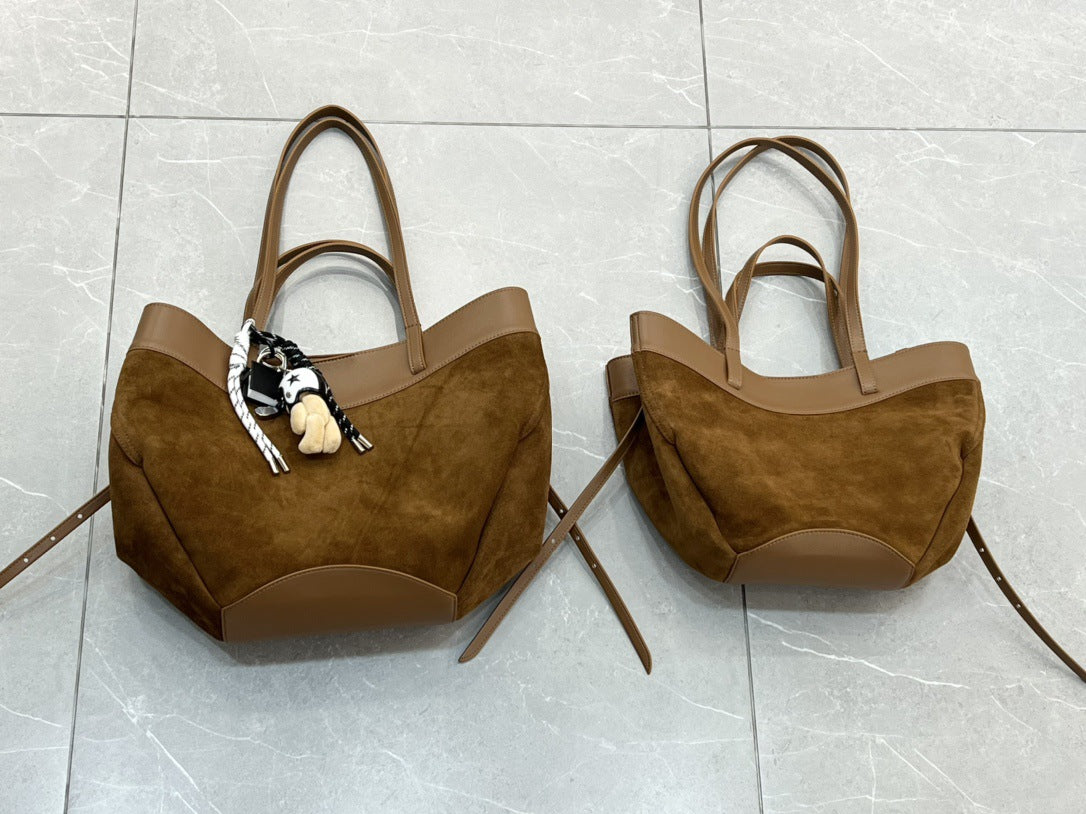 磨砂真皮菜篮子包水桶包包女高级感小众手提包麂皮绒斜挎包锦囊包