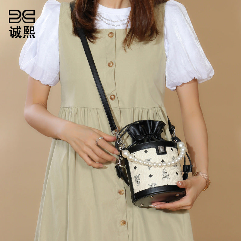 时尚印花新款兔子发财水桶包潮流珍珠手提圆筒包潮流单肩斜挎女包
