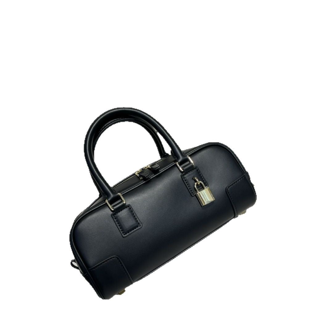 婉云质感真皮2025新款单肩斜挎包迷你复古手提保龄球包小众设计