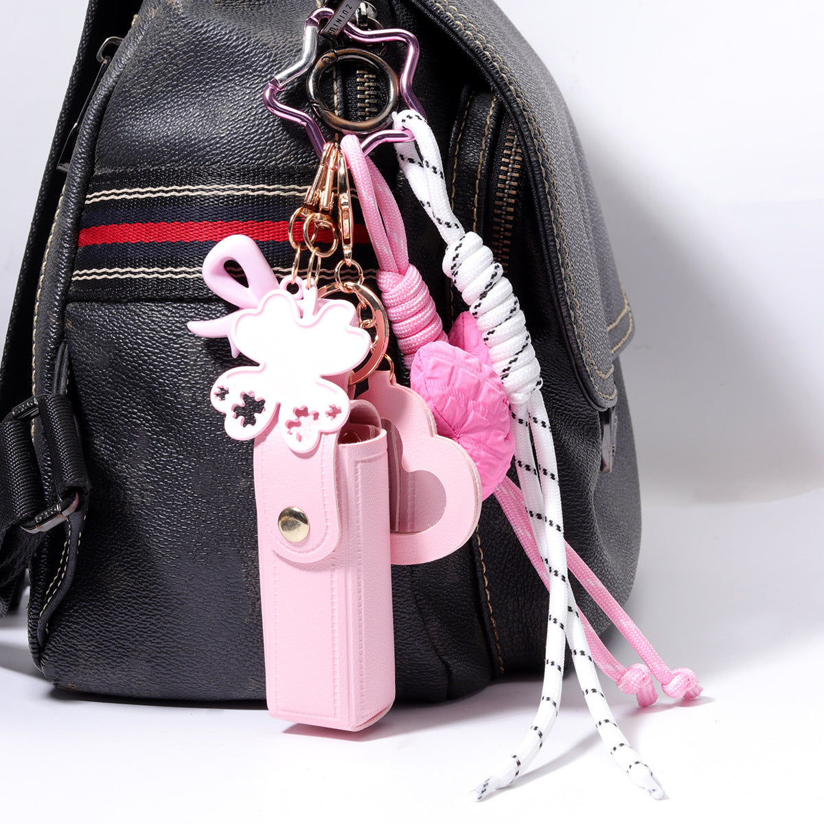 粉色口红皮套亚克力蝴蝶结包挂包包挂件批发miu系包挂绳子配饰