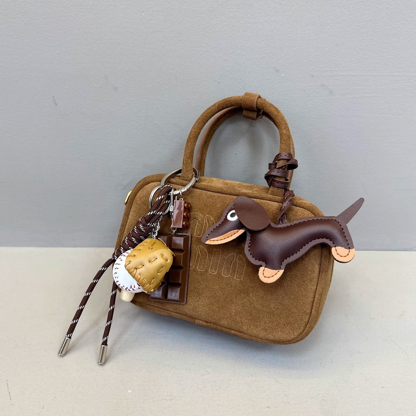 秋冬麂皮磨砂牛皮mini保龄球手提包真皮小方包手机包单肩斜挎包女