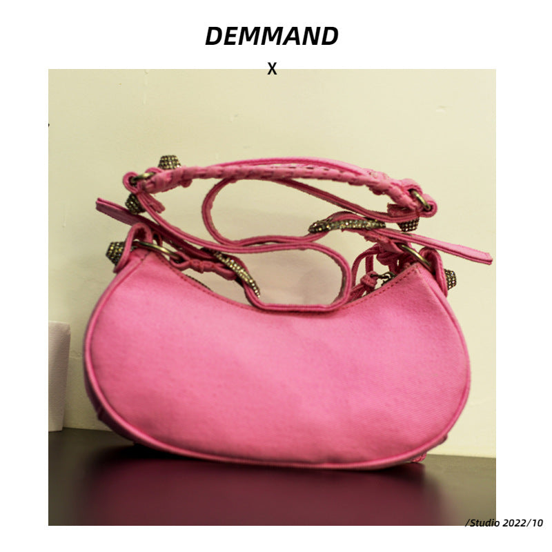 真皮包包女2022新款单肩轻奢月牙包质感法式腋下铆钉流苏褶斜挎