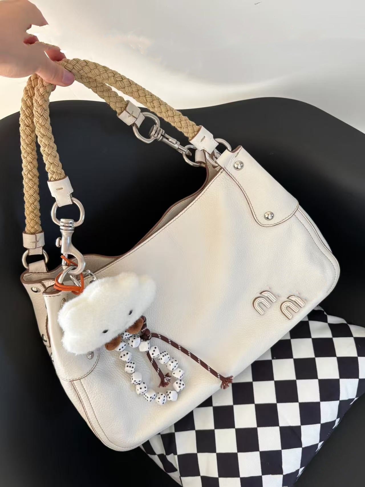 miu廖轻奢小众高级感腋下包2025新款夏季麻花手提单肩斜挎包女