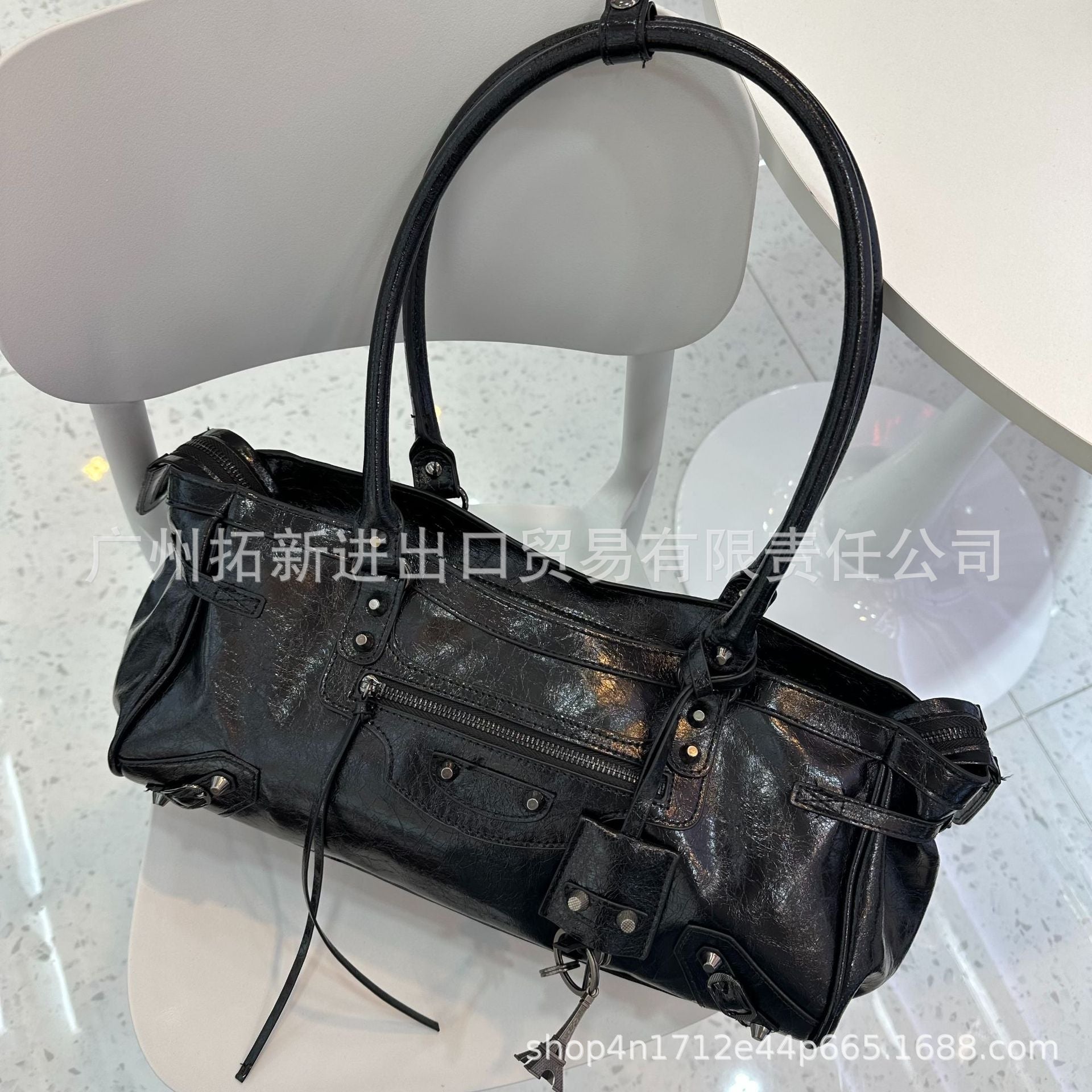 跨境新爆款B家lecity横款法棍铆钉流苏单肩包手提包包时髦简约女