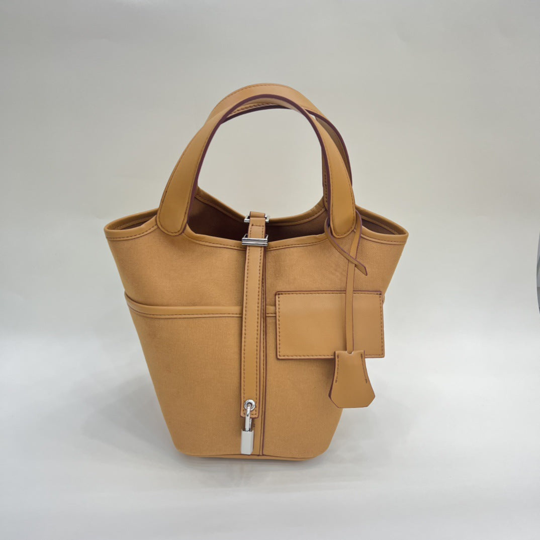 小众设计蜡线菜篮子帆布拼接平纹真牛皮口袋包手提手拎女包水桶包