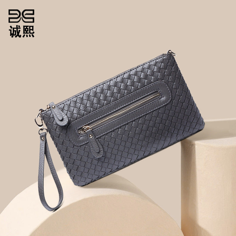 工厂直销2025新款韩版手工编织单肩斜挎多功能商务女士手拿信封包