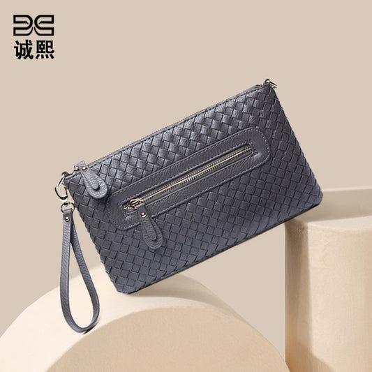 工厂直销2025新款韩版手工编织单肩斜挎多功能商务女士手拿信封包