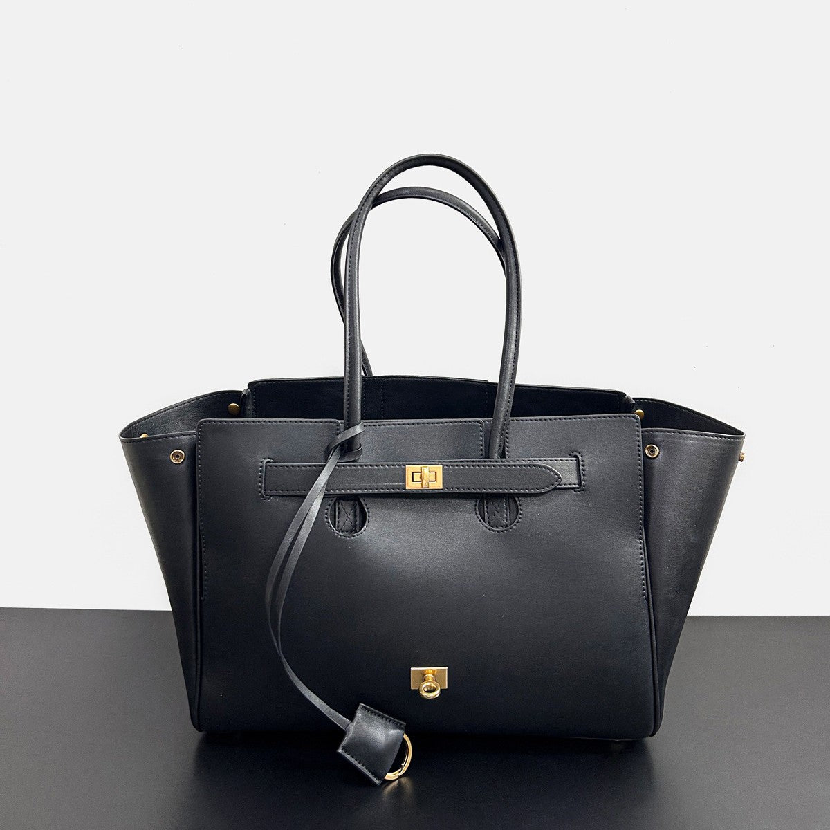 2024冬季新款锁扣托特包大容量中性机车包女头层牛皮真皮单肩包包