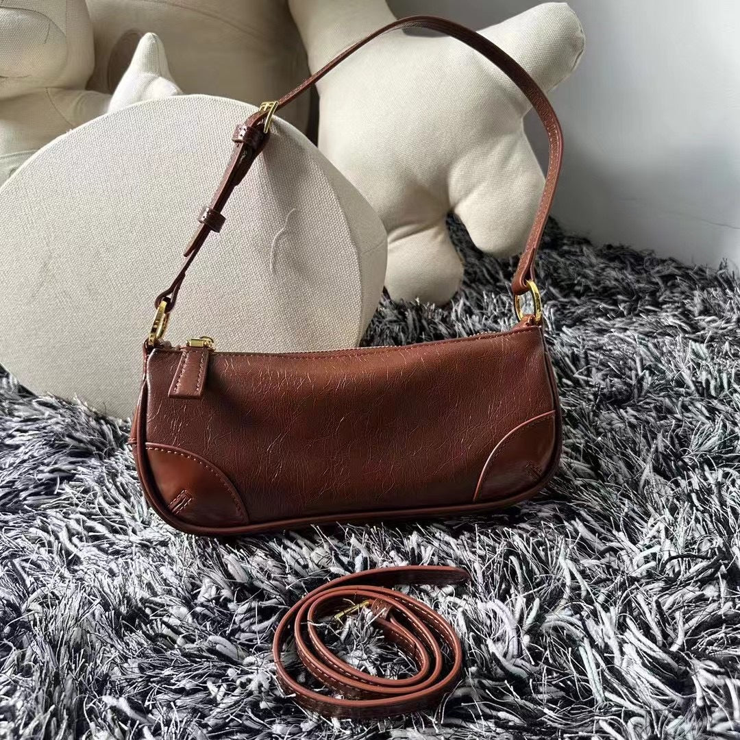 早春牛皮女包2024新款时尚潮流个性百搭单肩斜挎小包包潮真皮女包