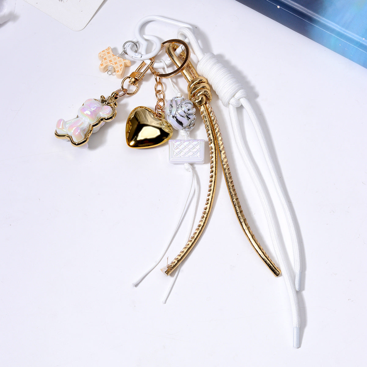 跨境货源义乌现货diy包包串珠挂件批发miu系包挂绳子手机链配饰