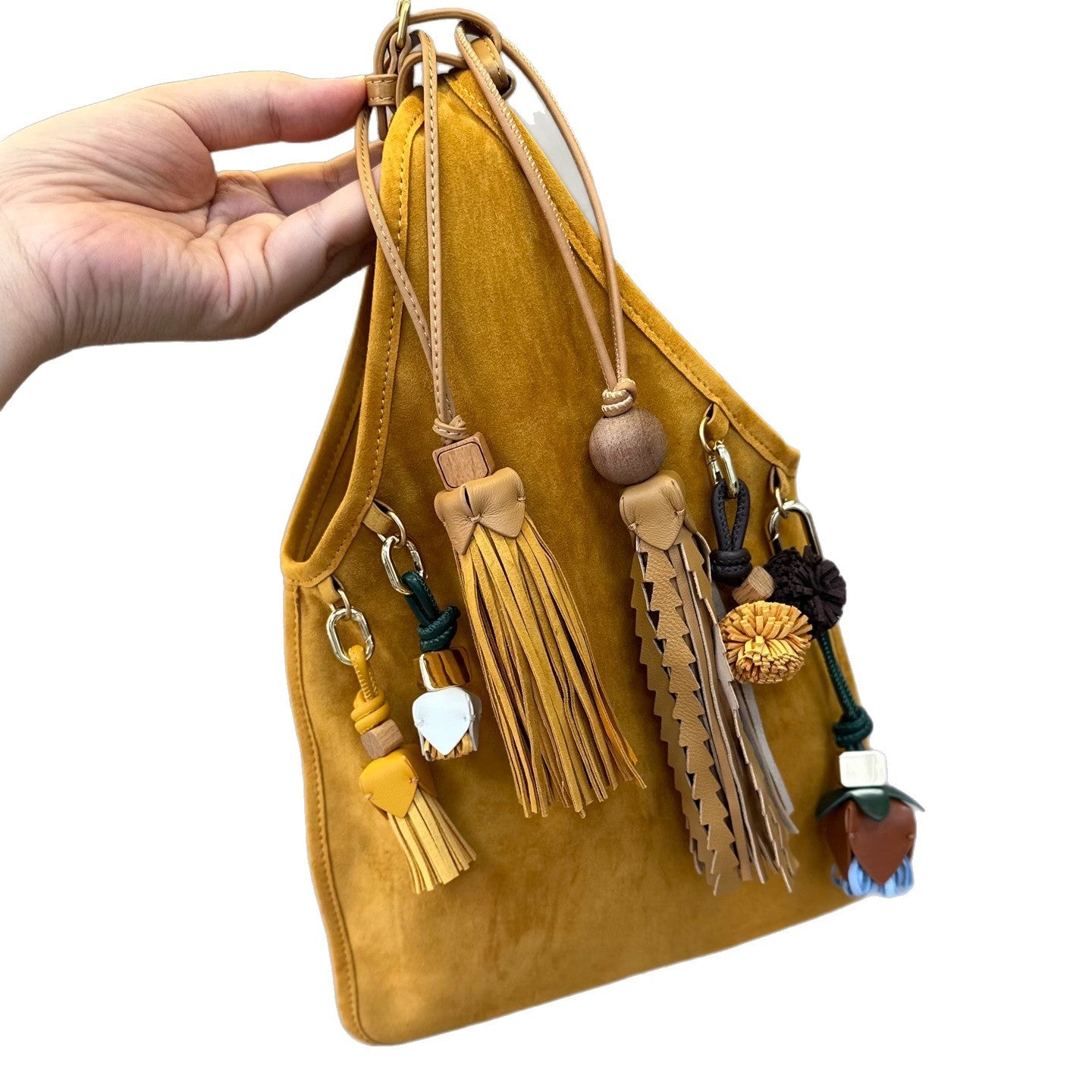 繆家2025新款麂皮流苏腋下包翻毛真皮复古手提包女玩偶挂件手拎包