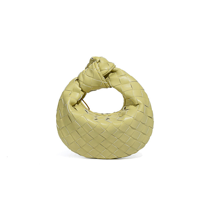 外贸新品时尚手拎饺子包打结手工编织女包百搭mini质感纯色牛角包