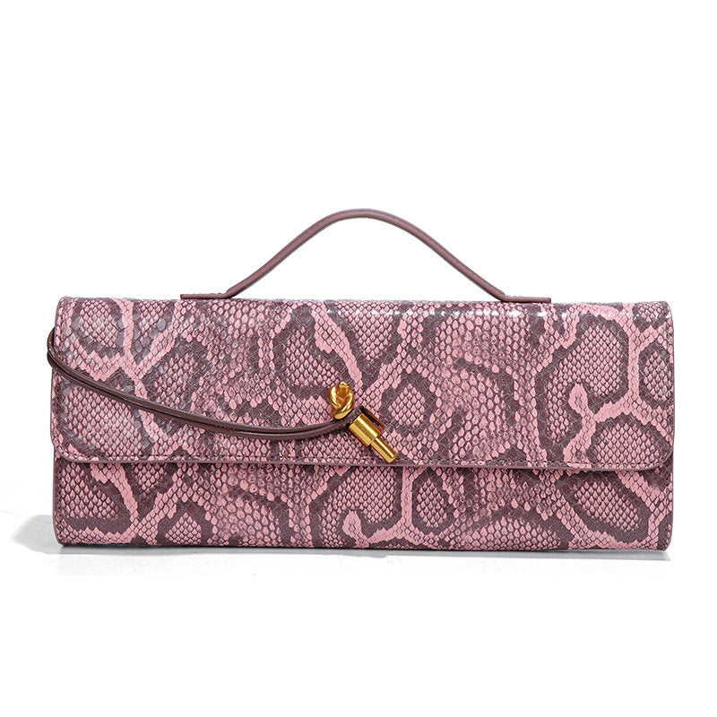 高级感手拿晚宴包包女款横版潮流石头纹法棍包复古小众单肩斜挎包