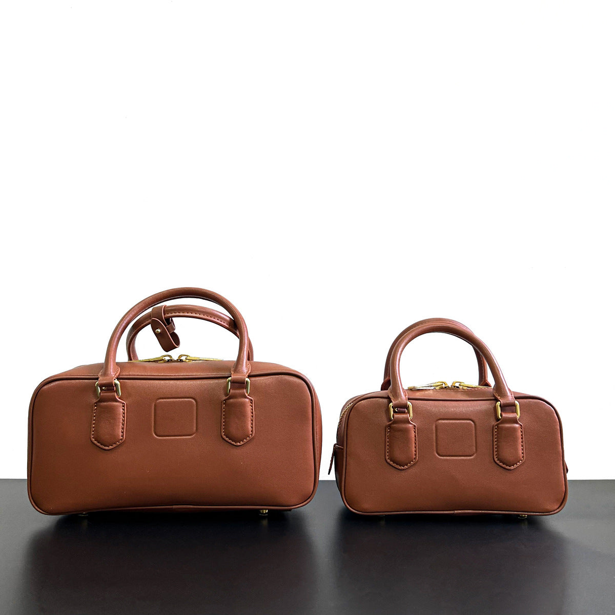 秋冬小包包女2023新款斜挎包单肩手提枕头包复古波士顿保龄球包