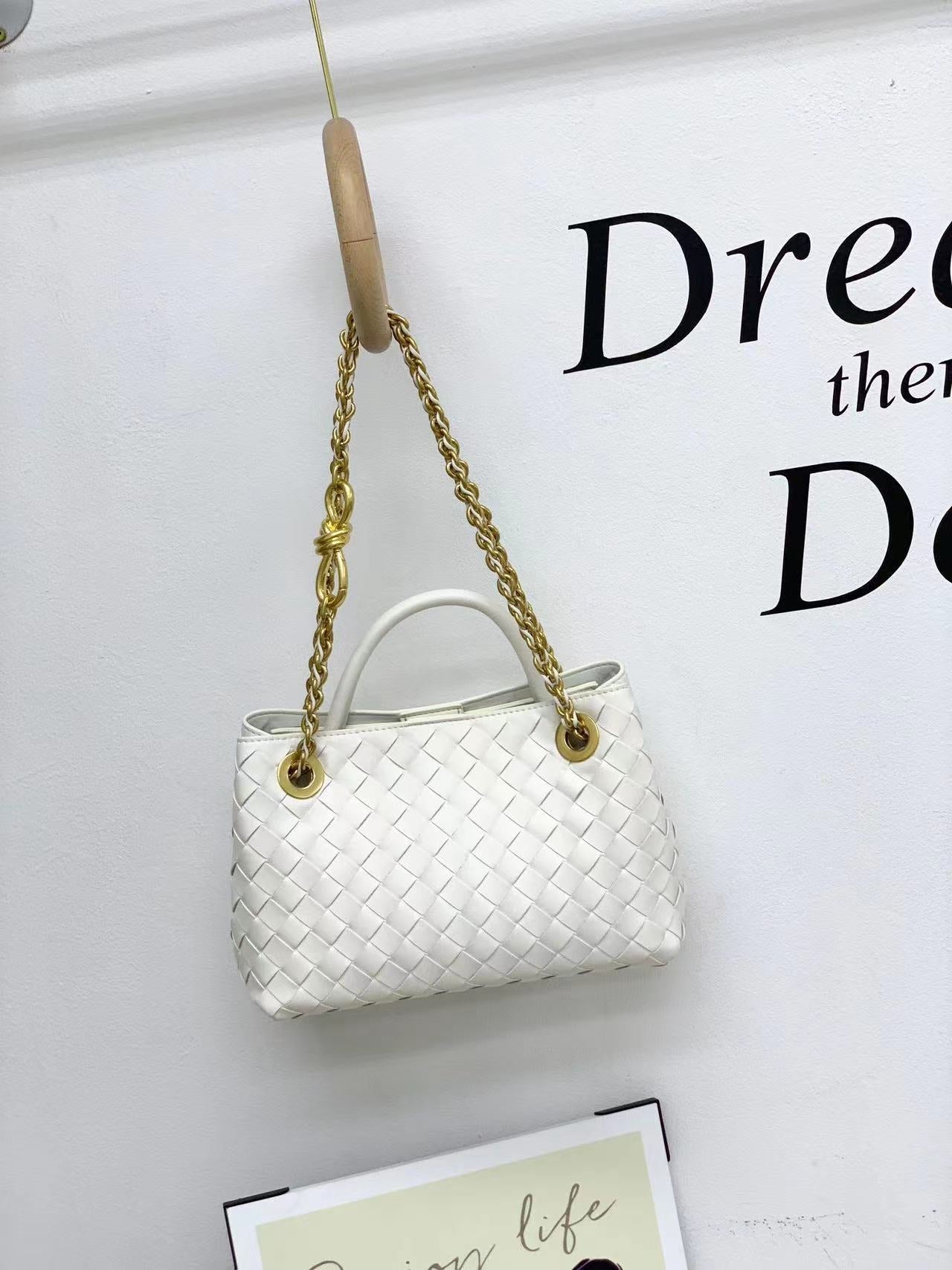 新款编织牛皮金属绳扣单肩包手提出街通勤购物袋百搭时尚潮流小众